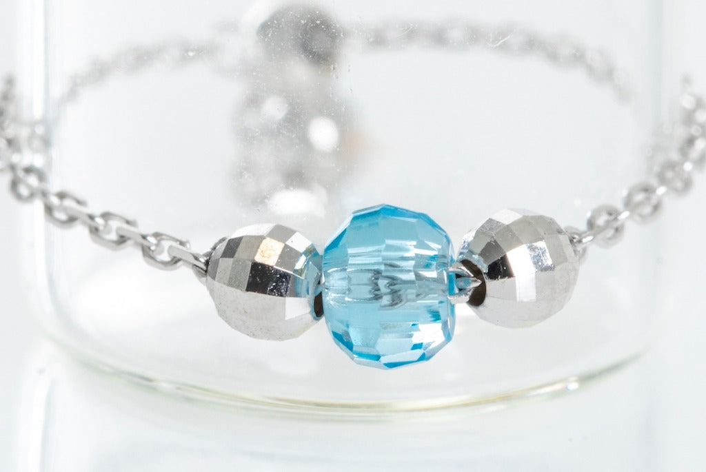  White Chain Ring with blue topaz