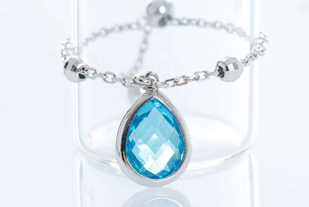 Women's Jewelry- Cocktail Blue Topaz Drop Chain Ring